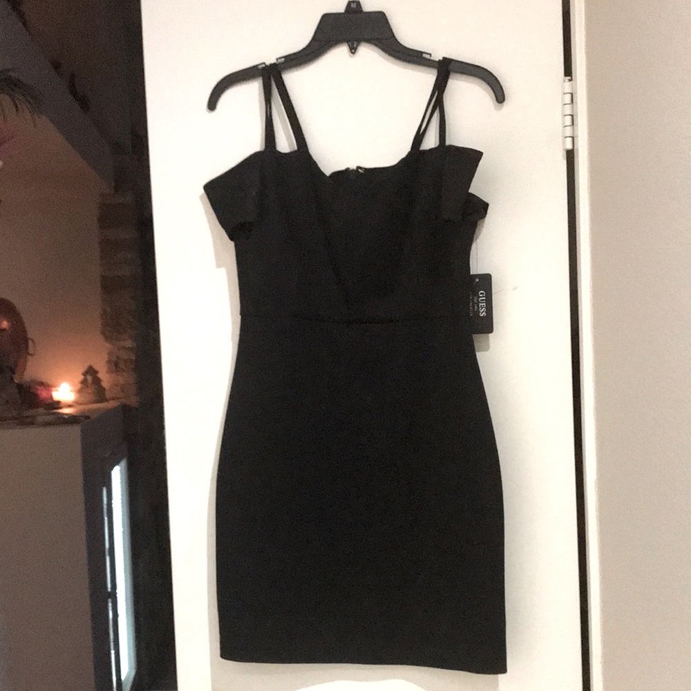 Black Guess cocktail dress never worn. Small size 6